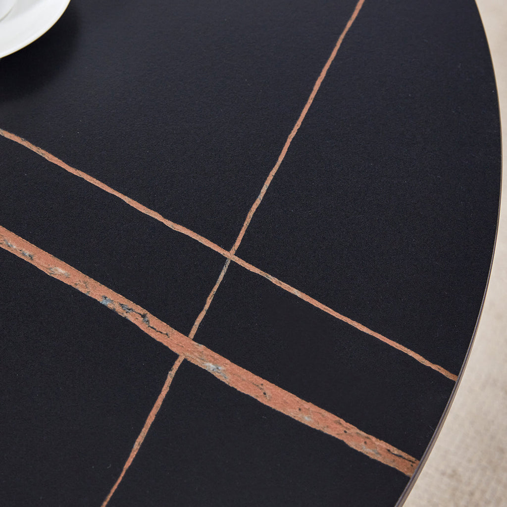 The 42-inch stainless steel gold-plated flamed granite round table with seating for 4 or 6 people is perfect for dining, entertaining, or as a conference table