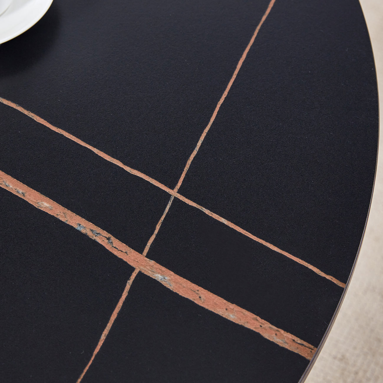The 42-inch stainless steel gold-plated flamed granite round table with seating for 4 or 6 people is perfect for dining, entertaining, or as a conference table