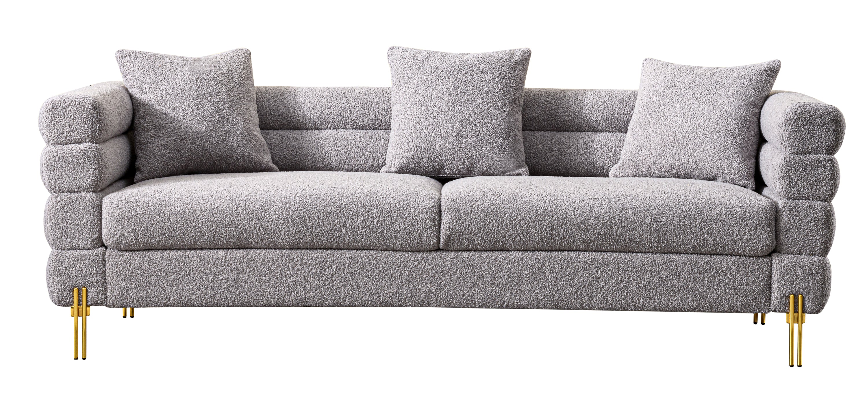 Luxurious and comfortable upholstered sofa with golden legs and pillows for living room and reception area
