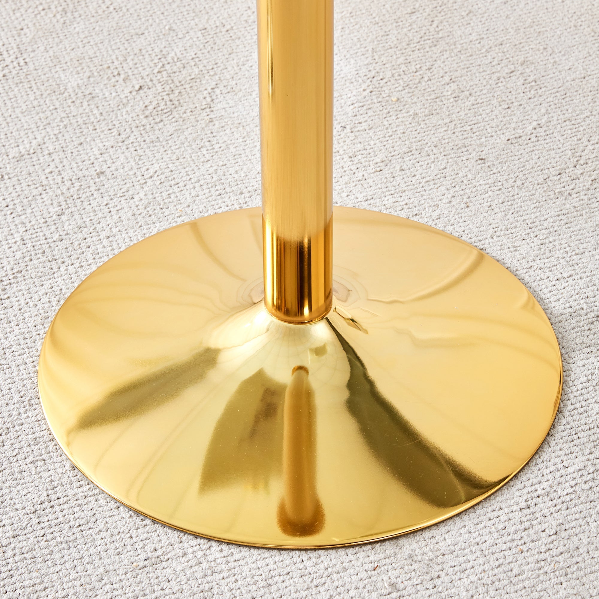 A 35-inch diameter glass top and a modern, minimalist round dining table with gold metal legs. Ideal for dining rooms, living rooms and meeting rooms.W1151P263755