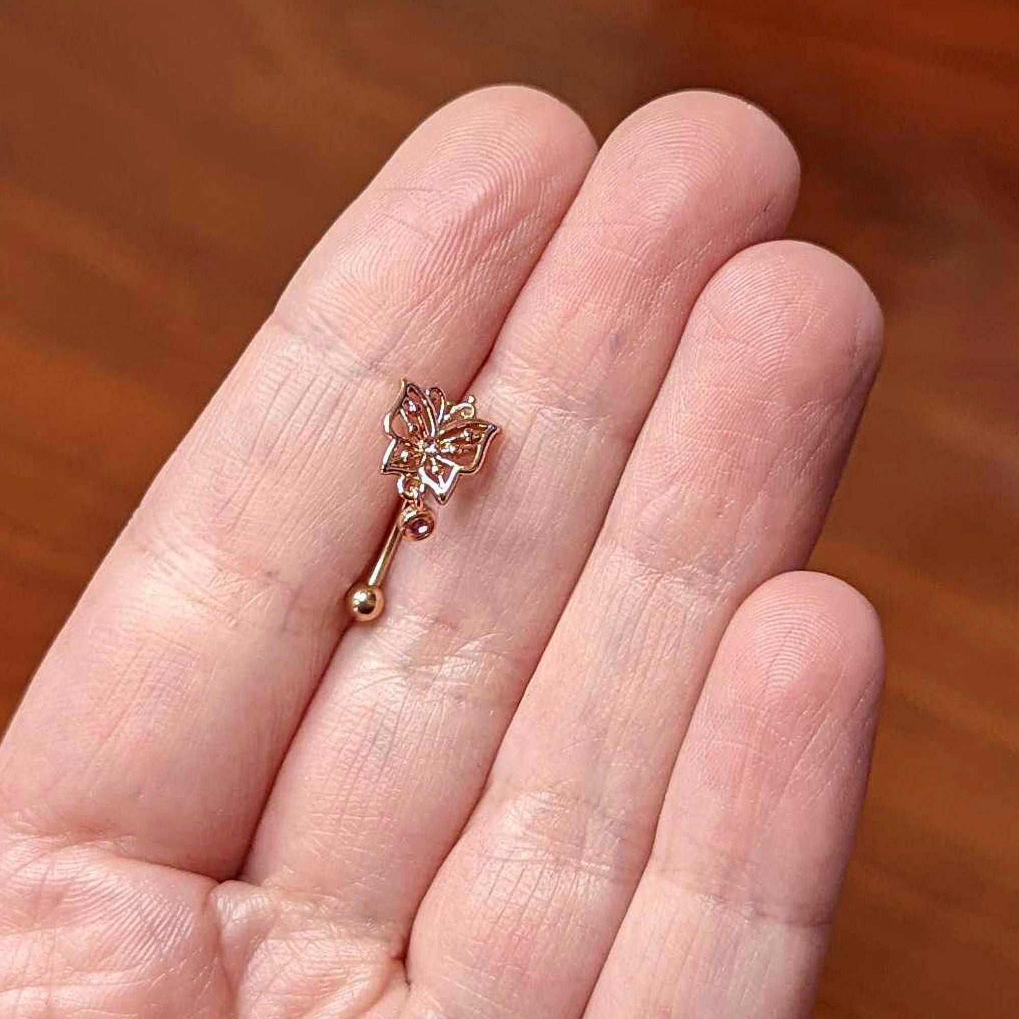16G 5/16 Pink CZ Gem Rose Gold Tone Butterfly Curved Eyebrow Ring