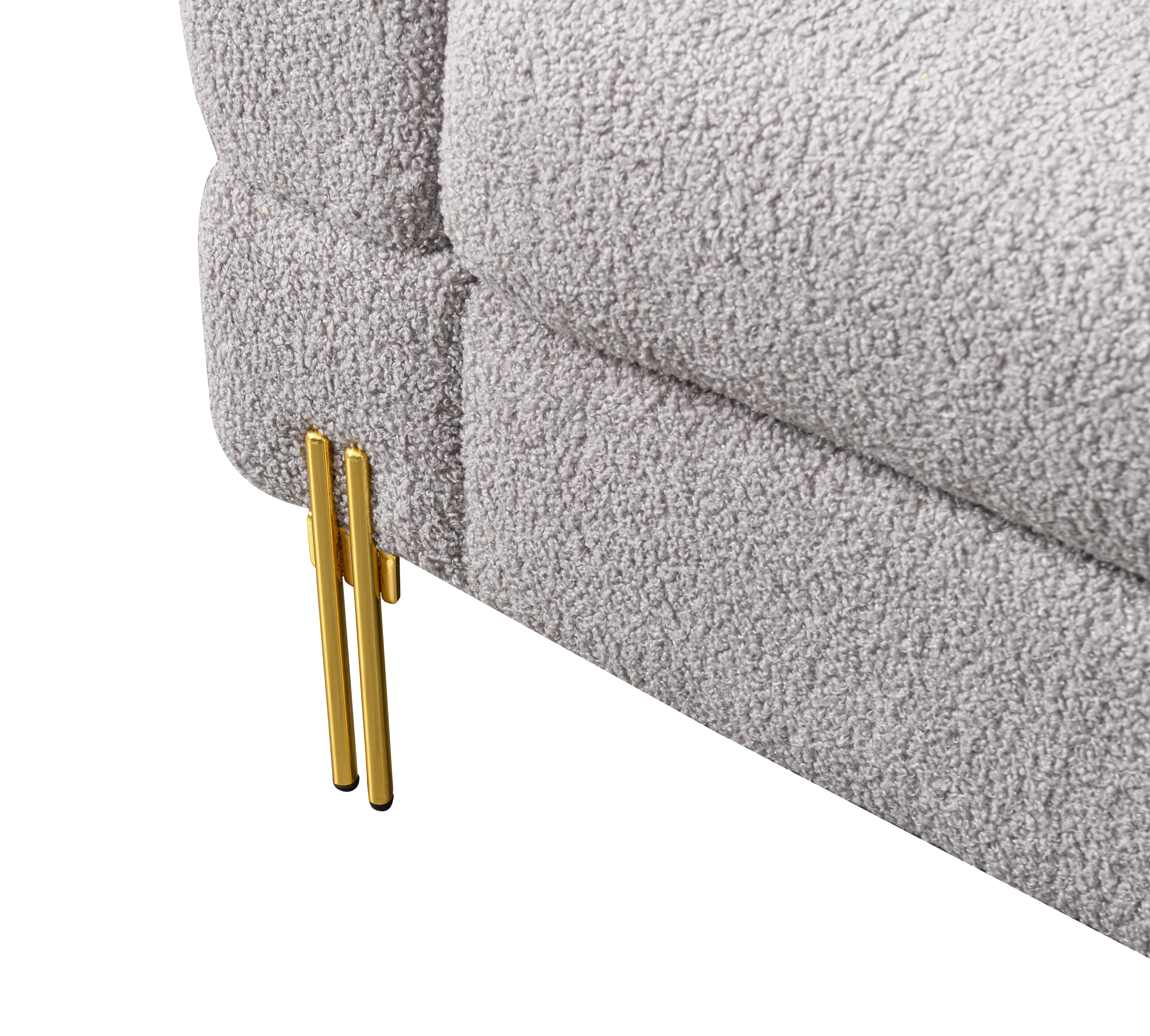 Luxurious and comfortable upholstered sofa with golden legs and pillows for living room and reception area