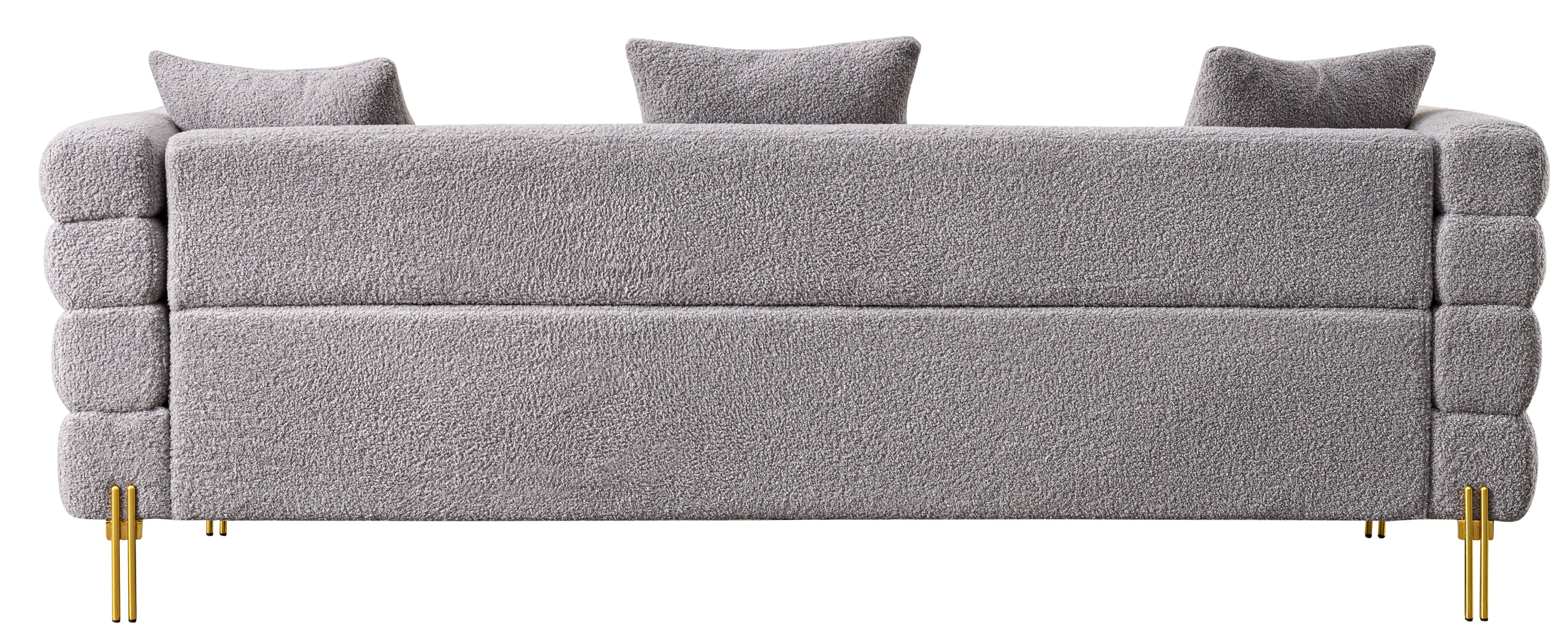Luxurious and comfortable upholstered sofa with golden legs and pillows for living room and reception area